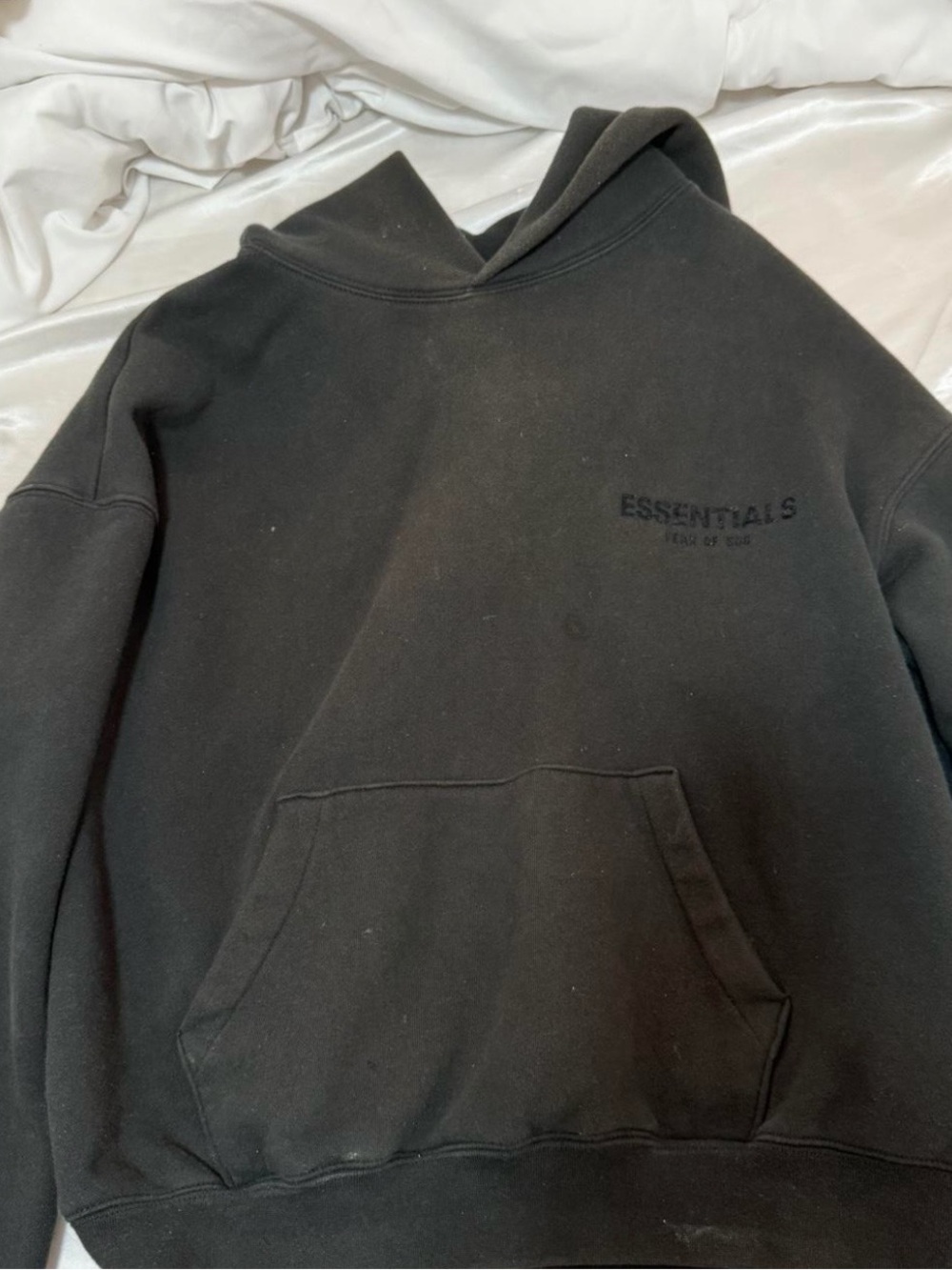 black essentials fear of god hoodie